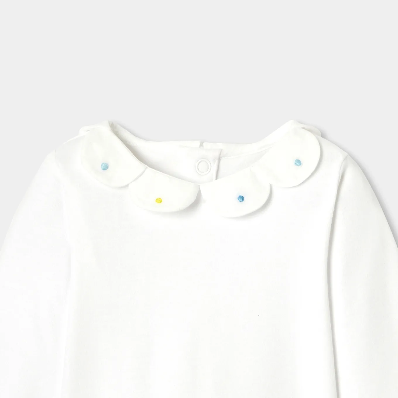 Baby girl bodysuit with petal collar