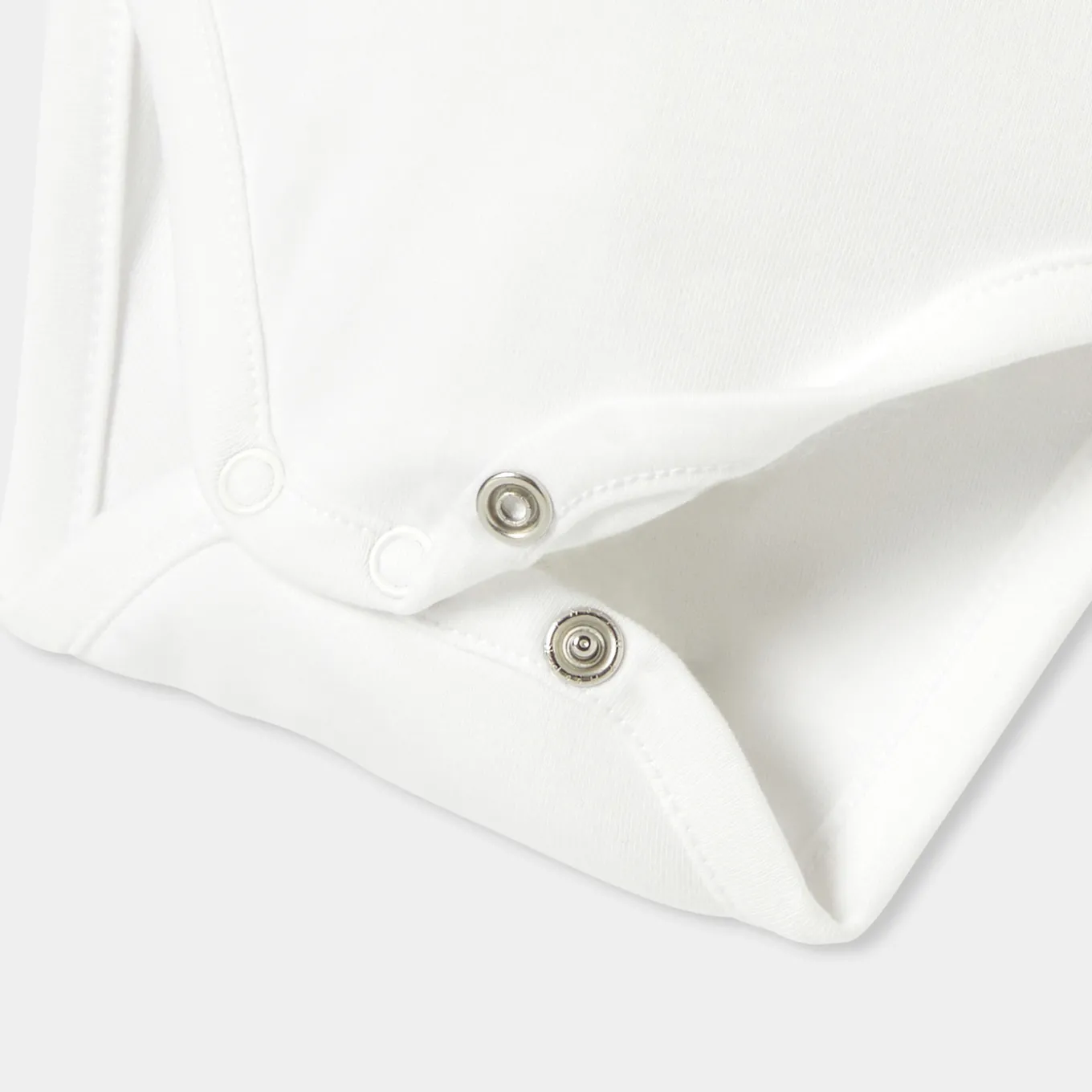 Baby girl bodysuit with petal collar