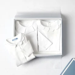 Baby girl bodysuit with scalloped collar